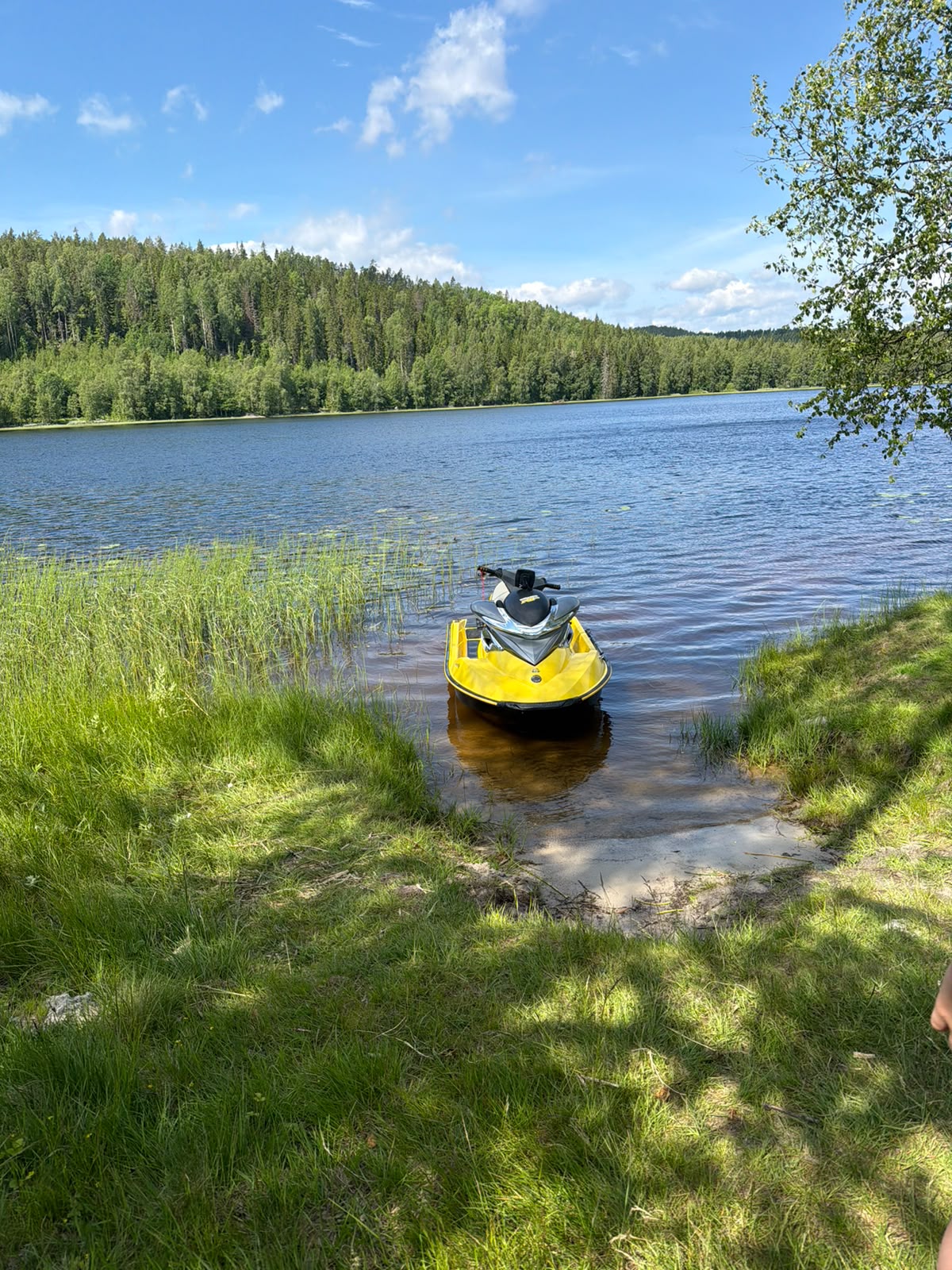 Jet ski ready on the shoreline